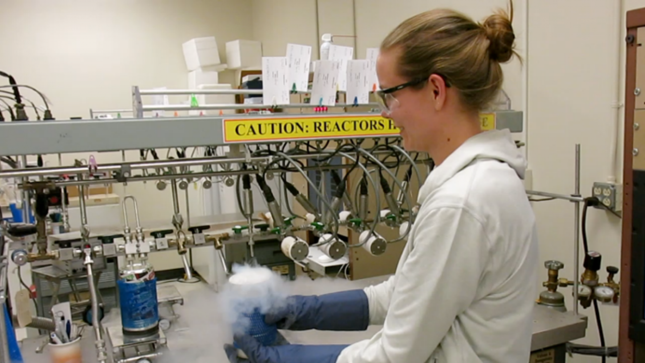 Lindsay Rodgers, using cryogenic distillation to remove water molecules from carbon dioxide in a vacuum line at the Lawrence Livermore National Laboratory. PC: Carina Fish