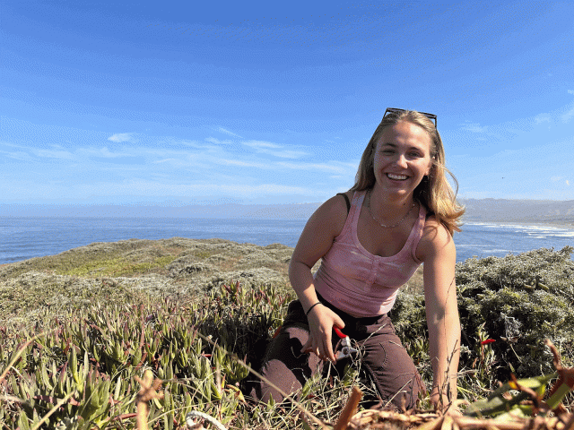 A person working in a coastal prairie