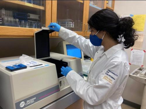 Audrey using a spectrophotometer at the lab