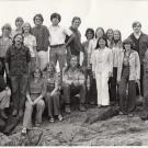 A black-and-white photo of a group of students standing on the rocks near BML. 
