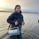 SRJC Intern Vanessa Cordova standing thigh deep in water during fieldwork